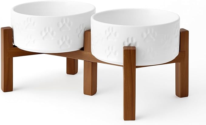 SPUNKYJUNKY Ceramic Elevated Dog Bowl Set with Acacia Wood Stand for Food and Water for Small Medium Sized Dogs (28.74 OZ, White, Dog Paw Pattern)